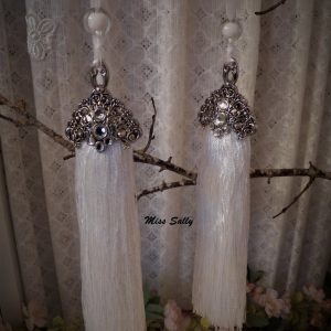 Epona tassel trekantig silver större